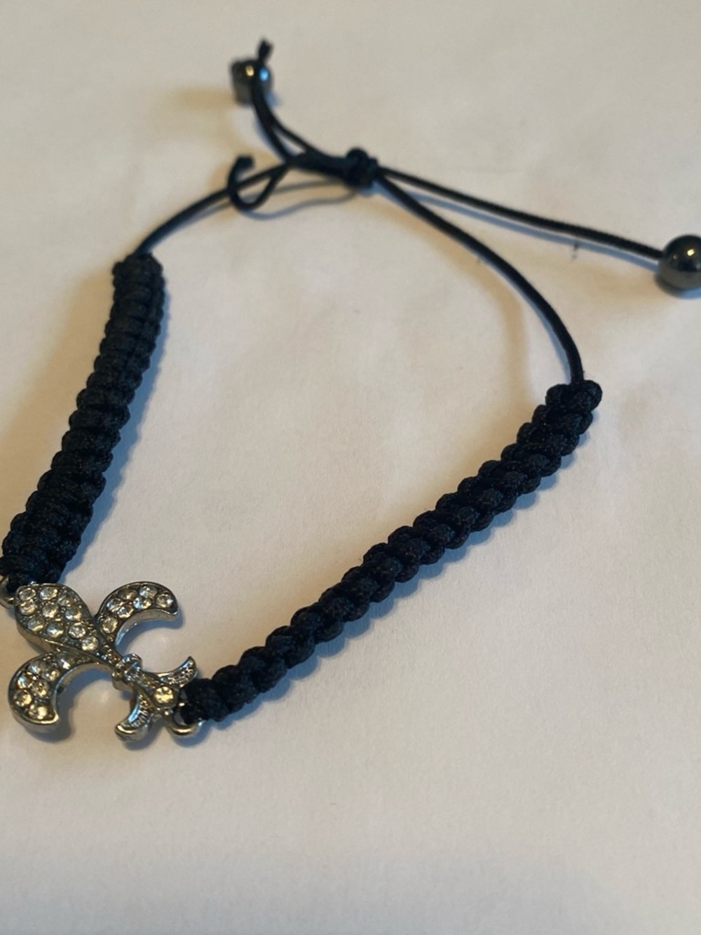 Black Macramé Bracelet with Crystal Fleur-de-Lis Charm